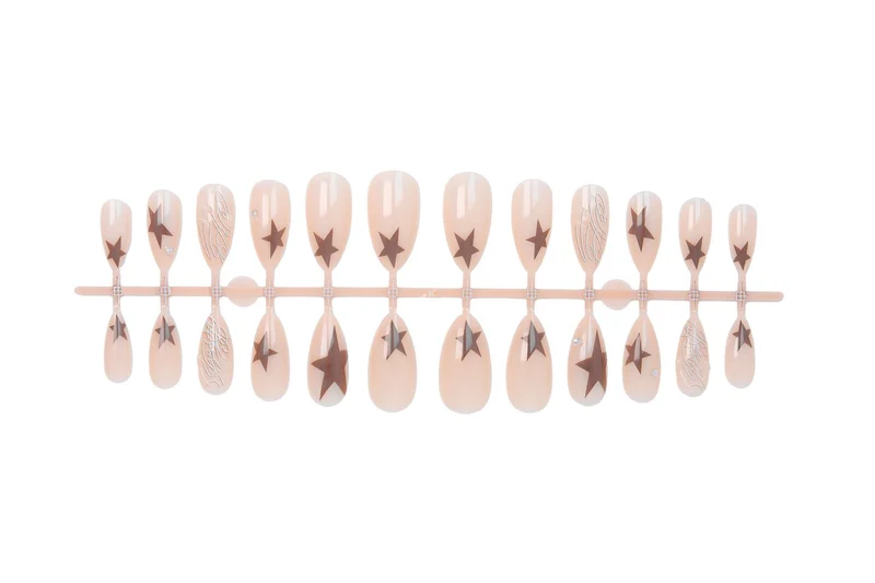Kunstnagelset mit eleganten Sternenmotiven und Glitzerakzenten Brehn