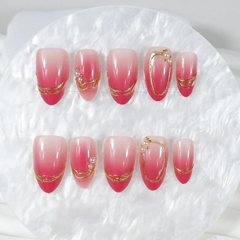 Kunstnagelset mit eleganten Ombré-Designs und Glitzerakzenten Brehn