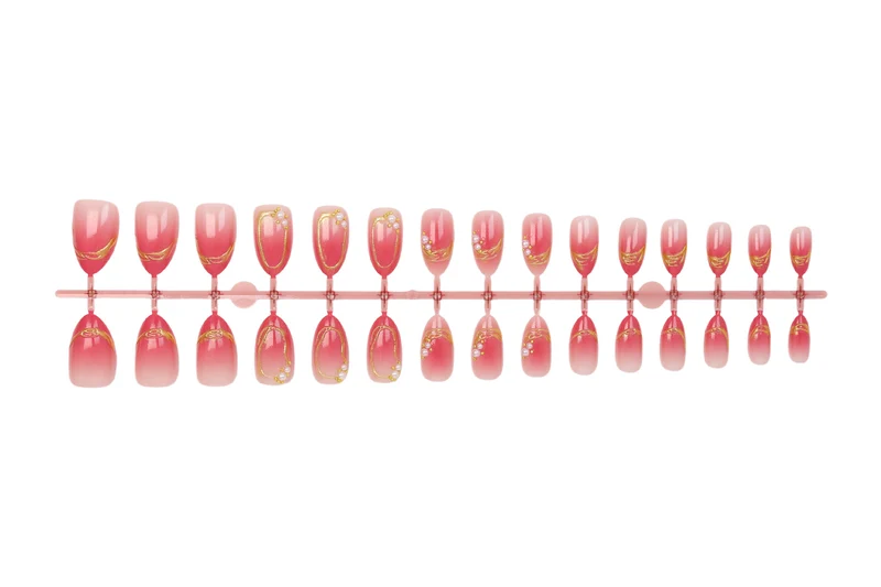 Kunstnagelset mit eleganten Ombré-Designs und Glitzerakzenten Brehn