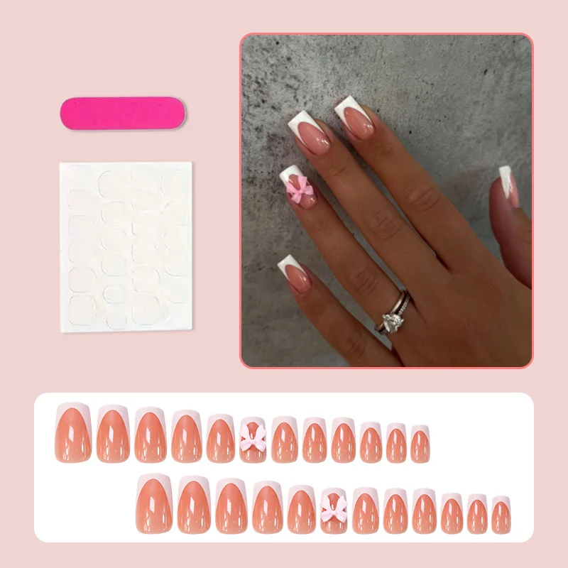 Kunstnagelset mit eleganten Spitzen und verspielten Schleifen Brehn