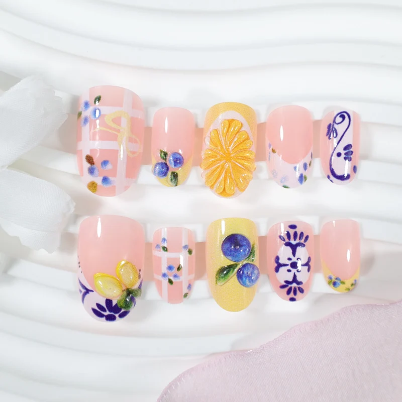Kunstnagelset mit eleganten Obst- und Blumenmustern Brehn