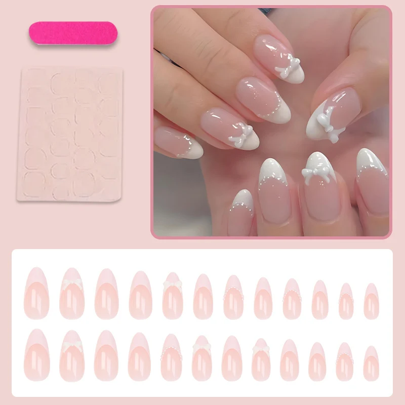 Kunstnagelset mit eleganten Schleifen und Spitzen Brehn