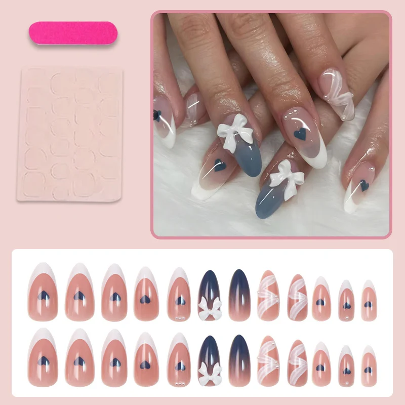 Kunstnagelset mit eleganten Schleifen und herzförmigen Akzenten Brehn