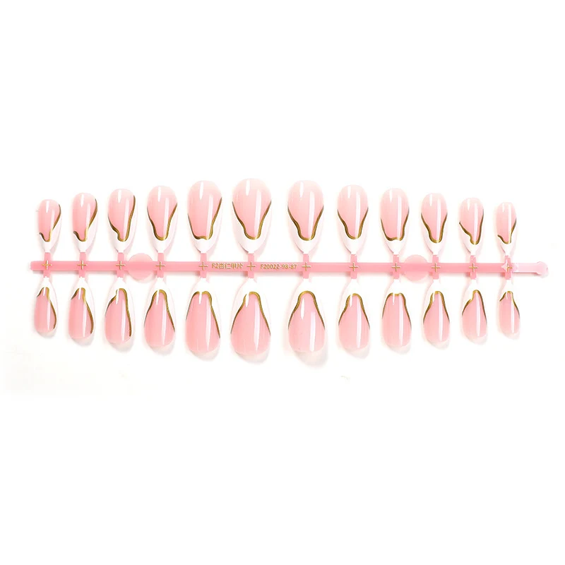 Kunstnagelset mit elegantem Goldrand und zartem Rosa Brehn