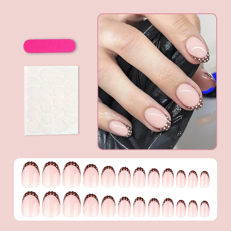 Kunstnagelset mit eleganten französischen Spitzen und dezenten Punkten Brehn
