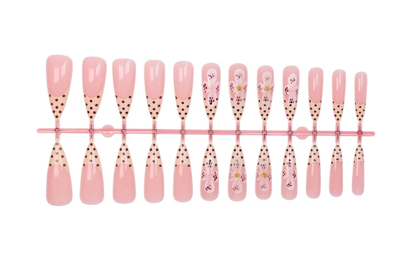 Kunstnagelset mit eleganten Blüten- und Punktemotiven Brehn