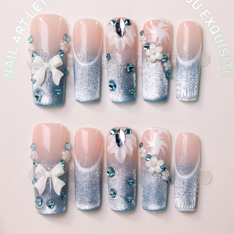 Kunstnagelset mit elegantem Glitzer-Design und feinen Verzierungen Brehn