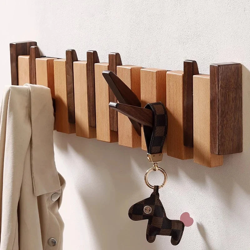 Wandgarderobe aus Holz im Klavierdesign mit klappbaren Haken | Skanto