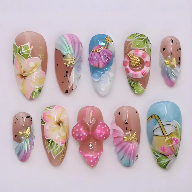 Kunstnagelset mit botanischen Designs und glamourösen Akzenten Brehn
