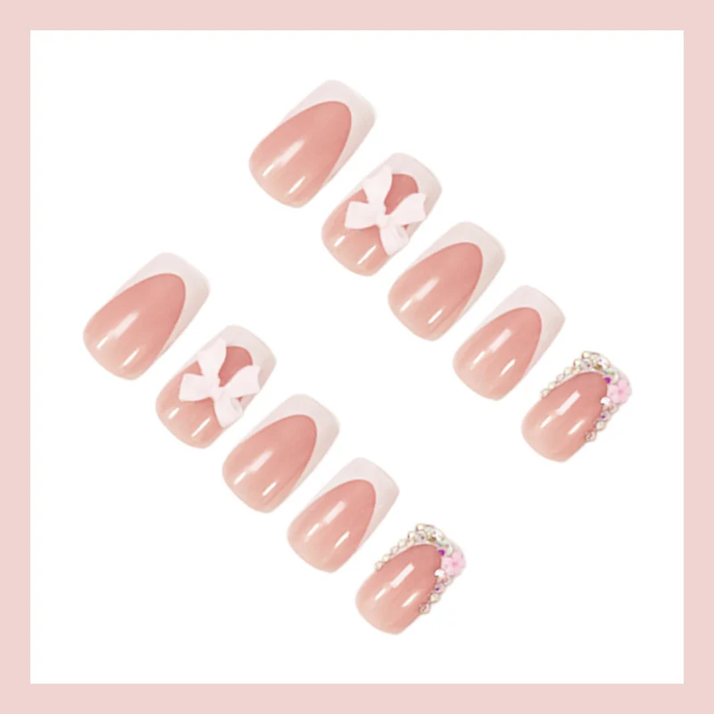 Kunstnagelset mit eleganten Schleifen- und Glitzerdesigns Brehn