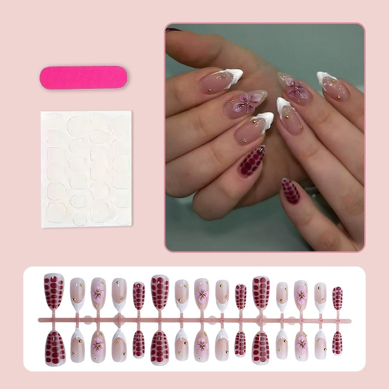 Kunstnagelset mit eleganten Blüten- und Glitzerakzenten Brehn