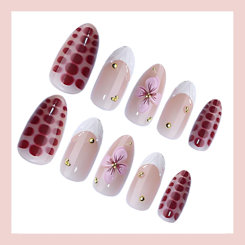 Kunstnagelset mit eleganten Blüten- und Glitzerakzenten Brehn