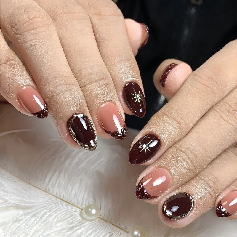 Kunstnagelset mit eleganten Farbverlauf und zarten Verzierungen Brehn