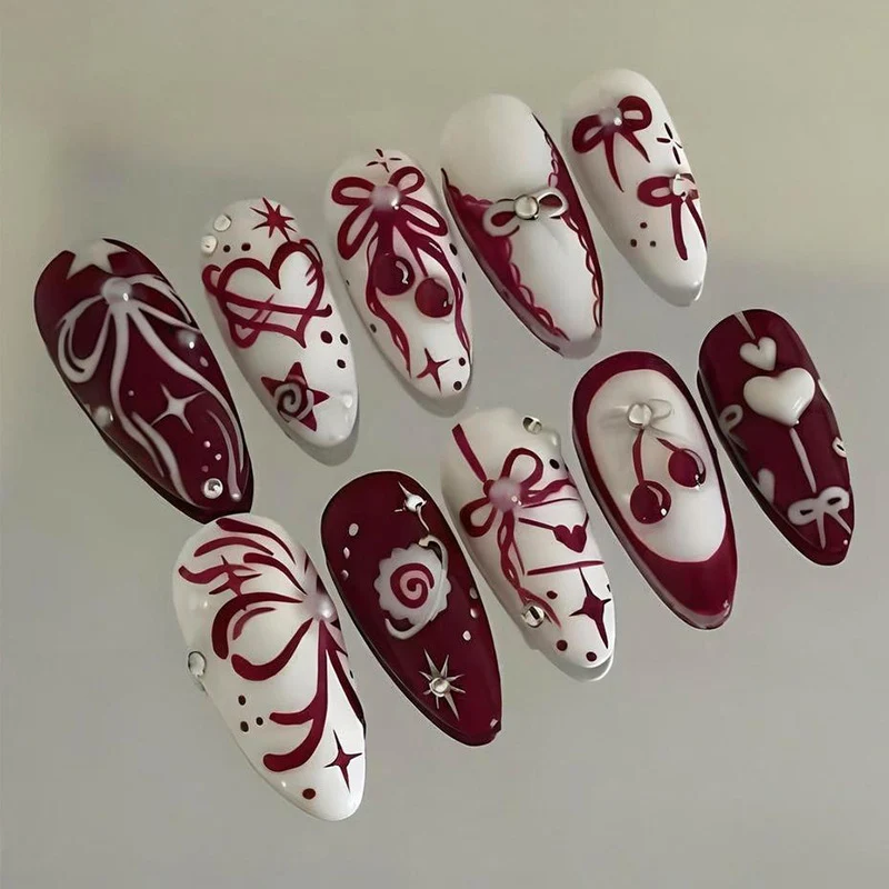 Kunstnagel Set mit romantischen Schleifen- und Blütenmotiven Brehn