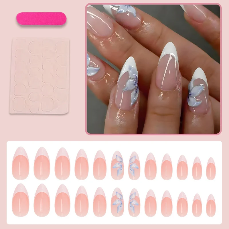 Kunstnagelset mit eleganten, blauen Blütenmotiven Brehn