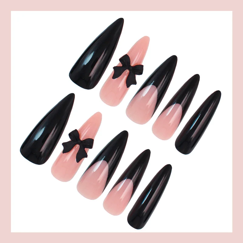Kunstnagelset mit elegantem Schwarz-Weiß-Design und spielerischen Akzenten Brehn