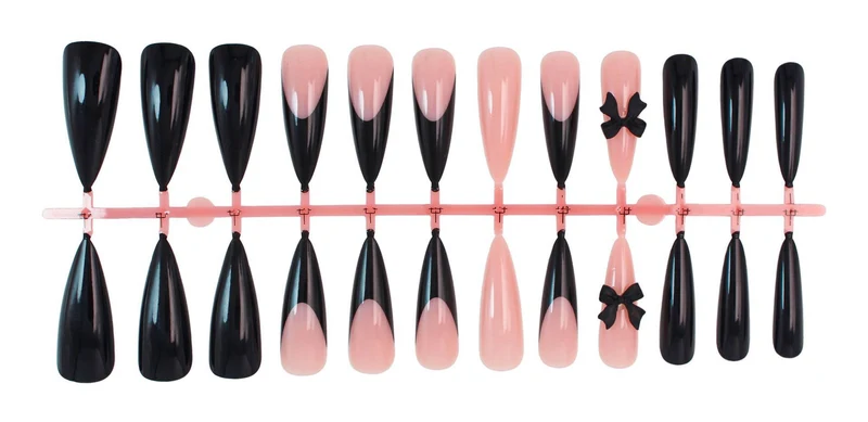 Kunstnagelset mit elegantem Schwarz-Weiß-Design und spielerischen Akzenten Brehn