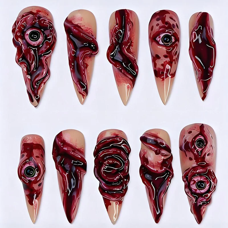 Kreatives Kunstnagelset mit gruseligem Design Brehn