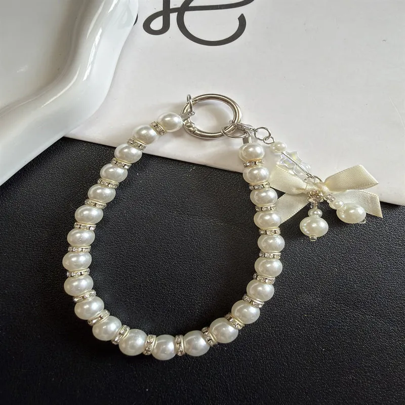 Elegante Perlen Charm Schlüsselanhänger Brehn