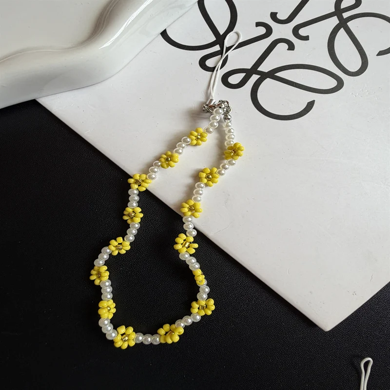 Blumiger Perlenbrillenhalter Brehn