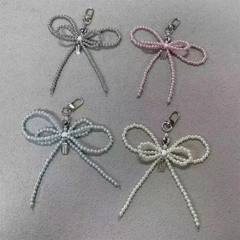 Elegante Perlenbogen Schlüsselanhänger Brehn