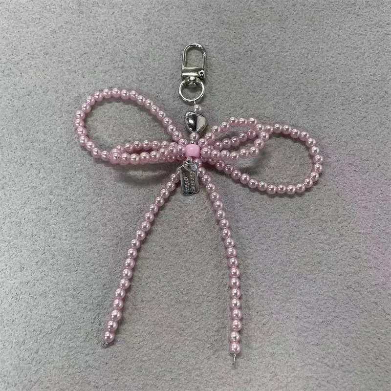 Elegante Perlenbogen Schlüsselanhänger Brehn