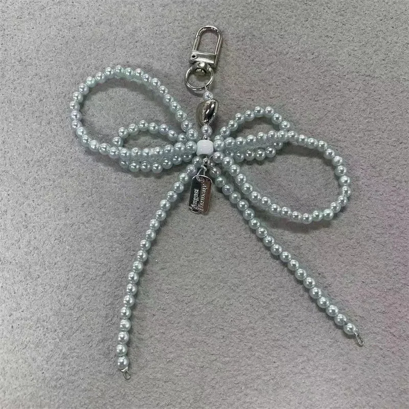 Elegante Perlenbogen Schlüsselanhänger Brehn