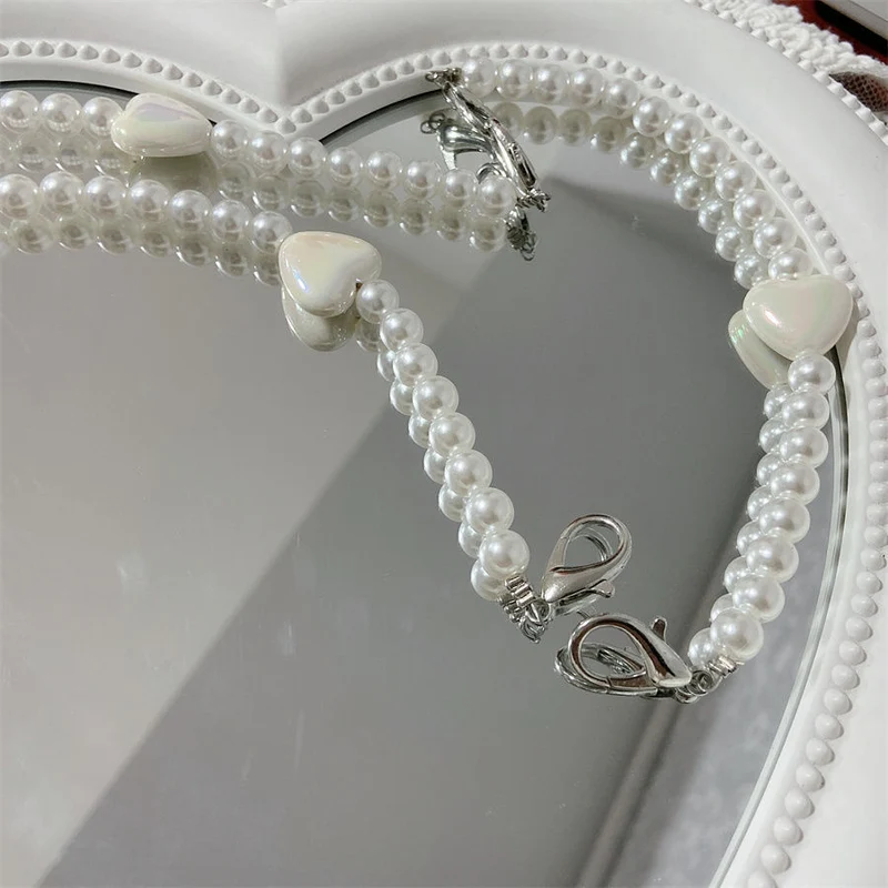 Eleganter Perlenbesetzter Brillenhalter Brehn