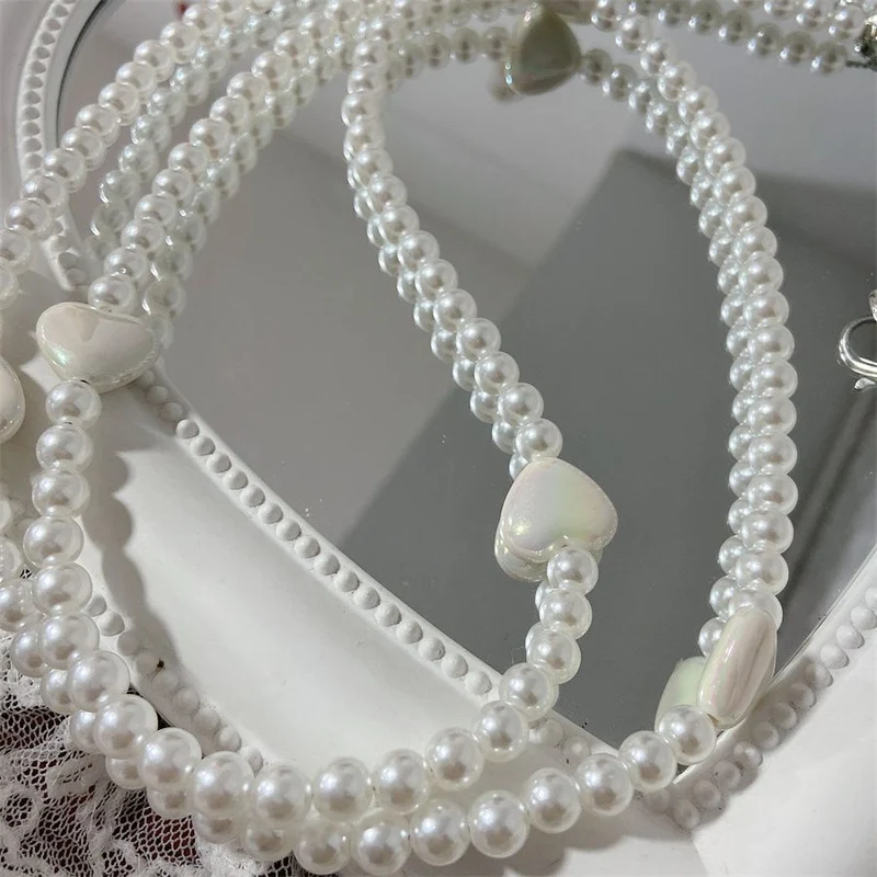 Eleganter Perlenbesetzter Brillenhalter Brehn