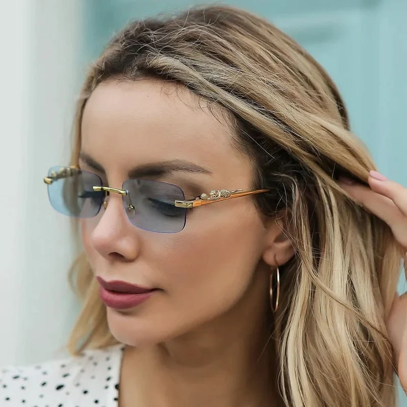Skanto | Randlose Sonnenbrille mit Leopardenkopf-Design und UV400-Schutz