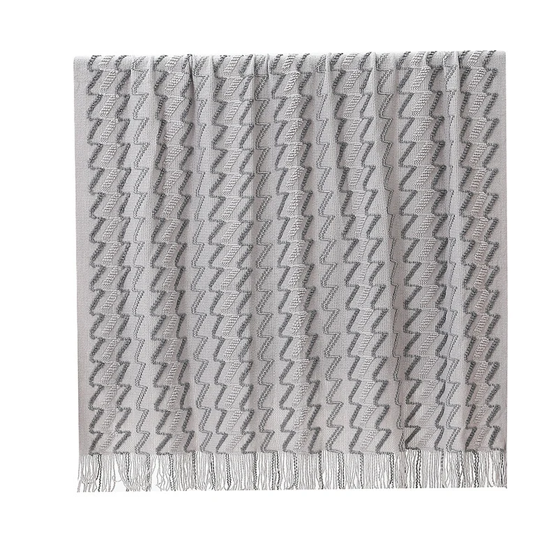Gemütliche Strickwurfdecke