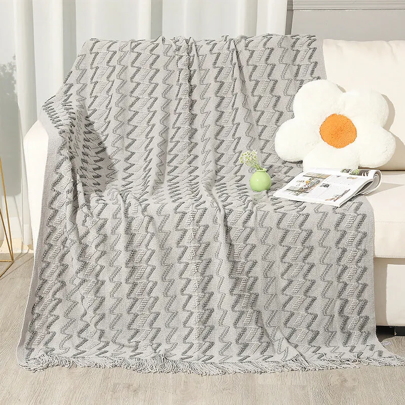 Gemütliche Strickwurfdecke