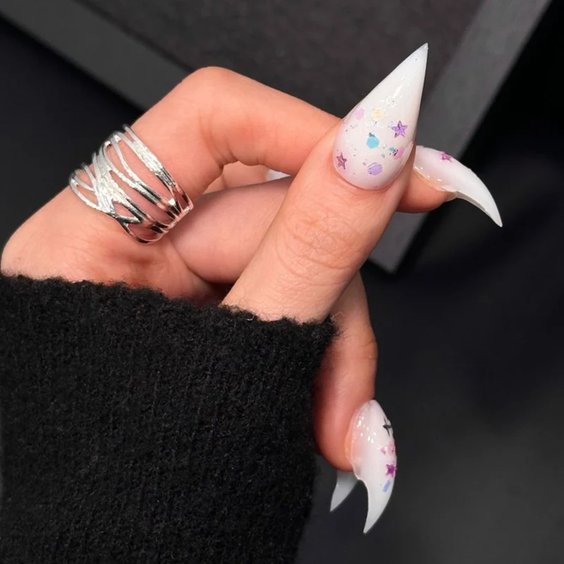 Stylisches Stiletto Press-On Nagelset mit Glitter und Sternelementen