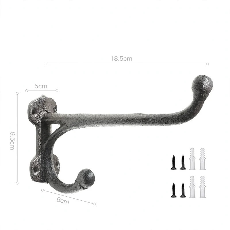 Gusseiserner Wandhaken mit Vogelmotiv
