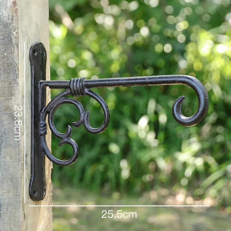 Gusseiserner Wandhaken mit Vogelmotiv