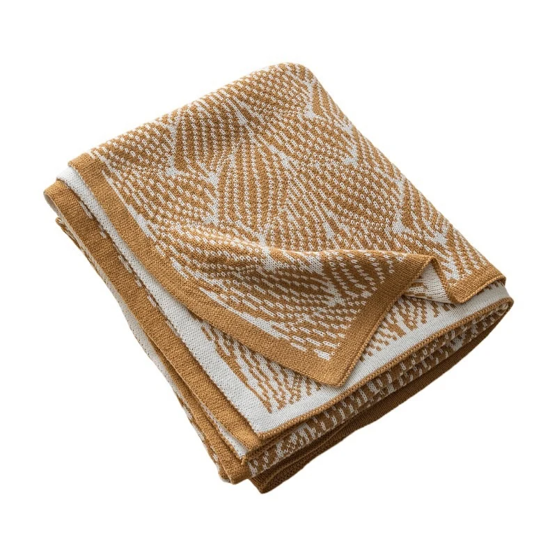 Dekorativer Strickwurfdecke