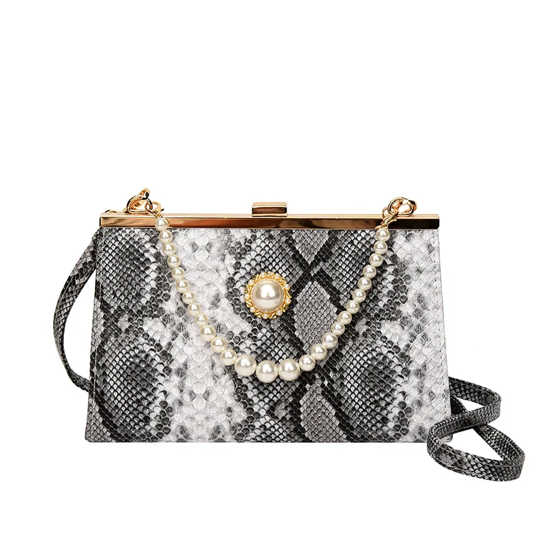 Elegante perlbesetzte Schlangenhaut-Clutch Tasche