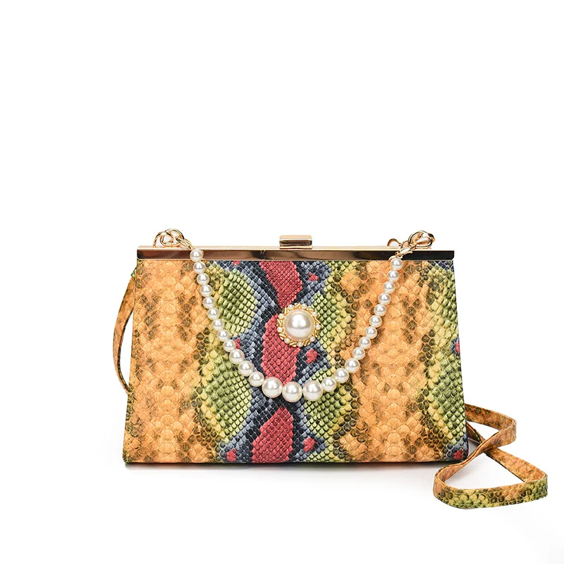Elegante perlbesetzte Schlangenhaut-Clutch Tasche