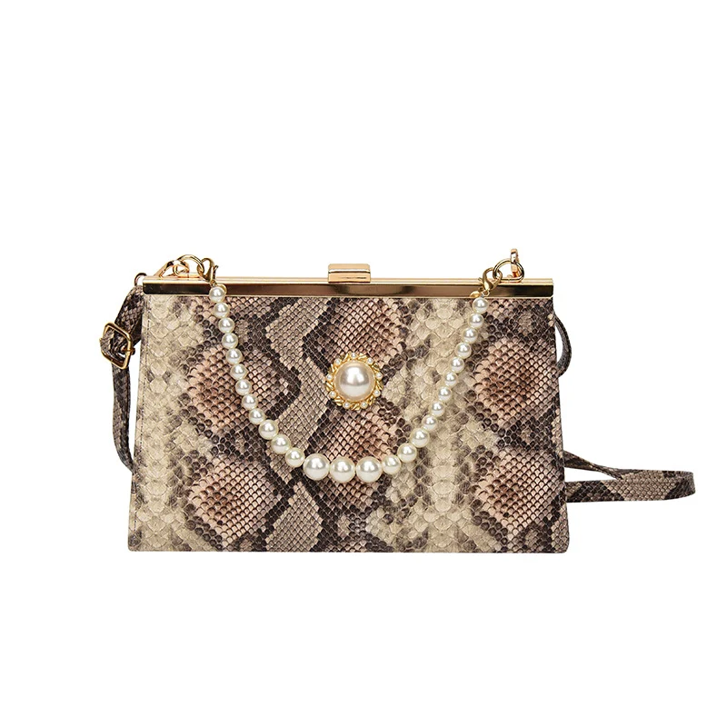 Elegante perlbesetzte Schlangenhaut-Clutch Tasche
