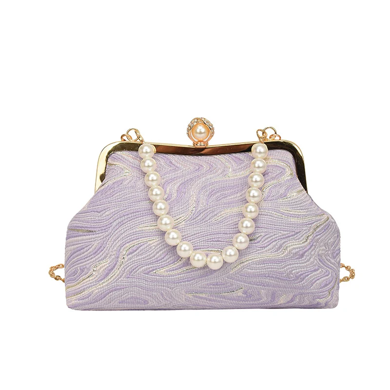 Elegante perlenverzierte Abendhandtasche