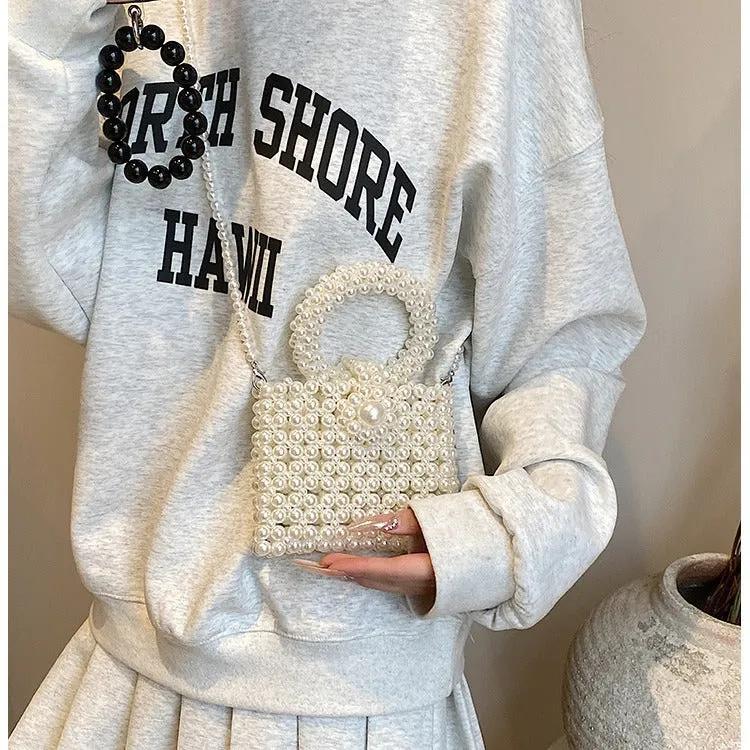 Elegante perlenverzierte Abendhandtasche