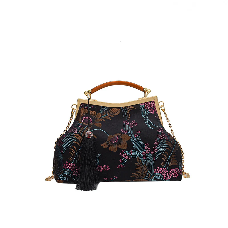 Elegante Blumenhandtasche