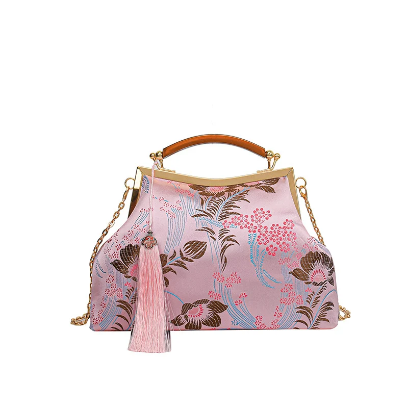 Elegante Blumenhandtasche