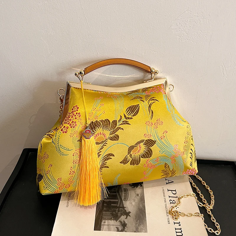 Elegante Blumenhandtasche