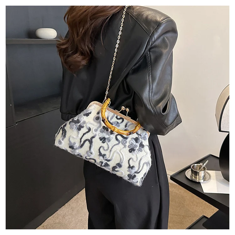 Elegante Blumenhandtasche