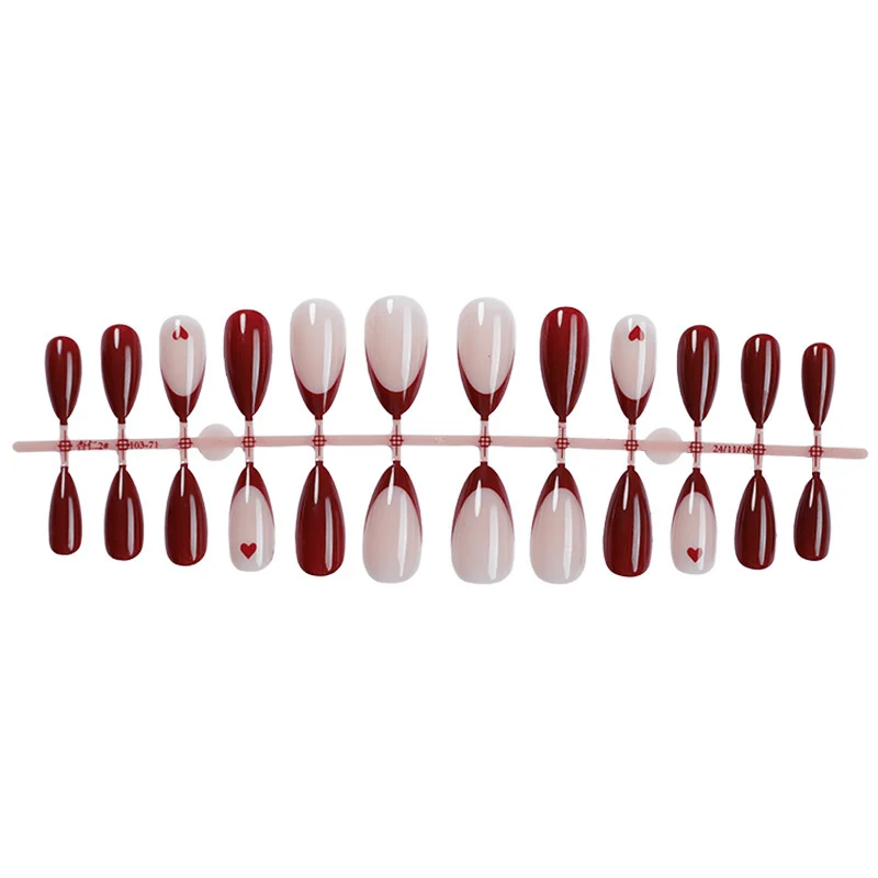 Kunstnagelset mit elegantem Farbverlauf und Herzmustern Brehn
