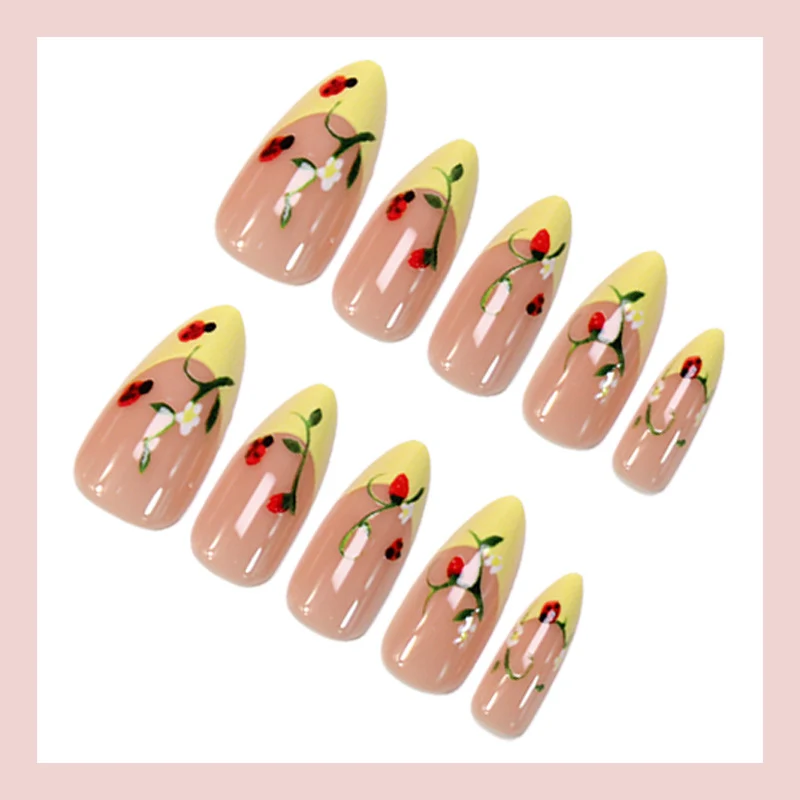 Kunstnagelset mit elegantem Farbverlauf und floralen Akzenten Brehn